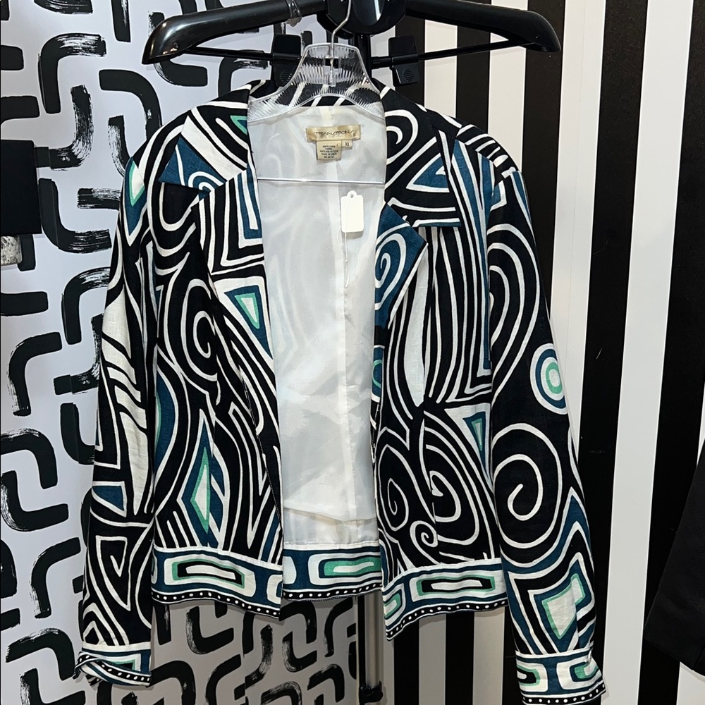 Artistic Black and White Patterned Jacket with Teal Accents